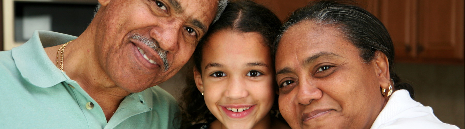 Grandparents and granddaughter taking a selfie